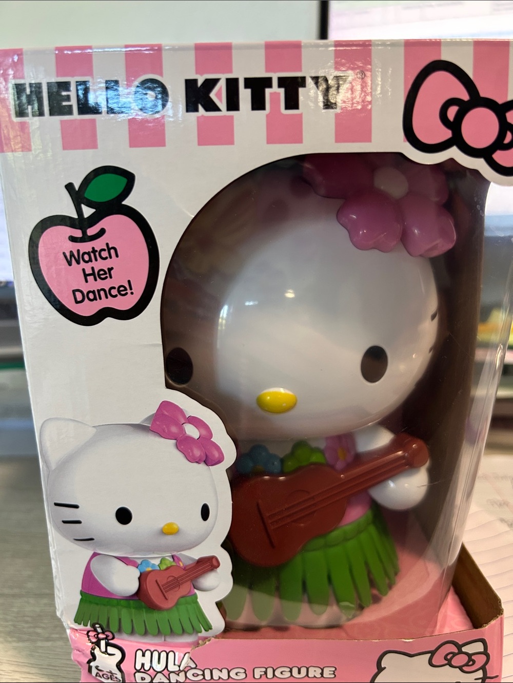 Hello Kitty White Figure with Pink Bow and Green Hula Skirt